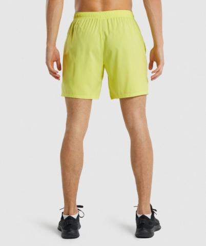 Gymshark Arrival 7" Men's Shorts Yellow | UAE-02HTOP