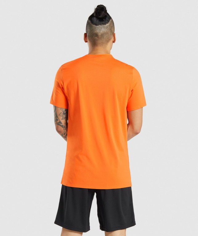 Gymshark Arrival Men's T Shirts Orange | UAE-65GMXN