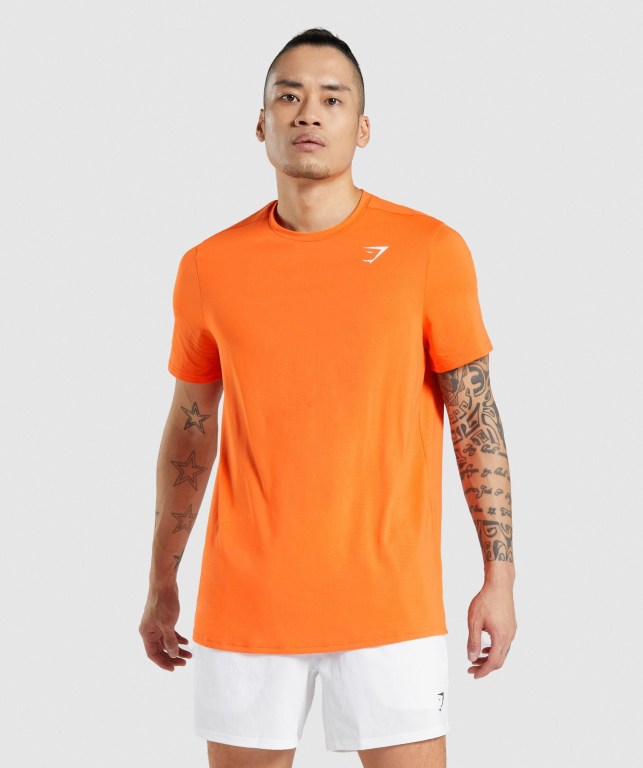 Gymshark Arrival Regular Fit Men\'s T Shirts Orange | UAE-70TVAJ